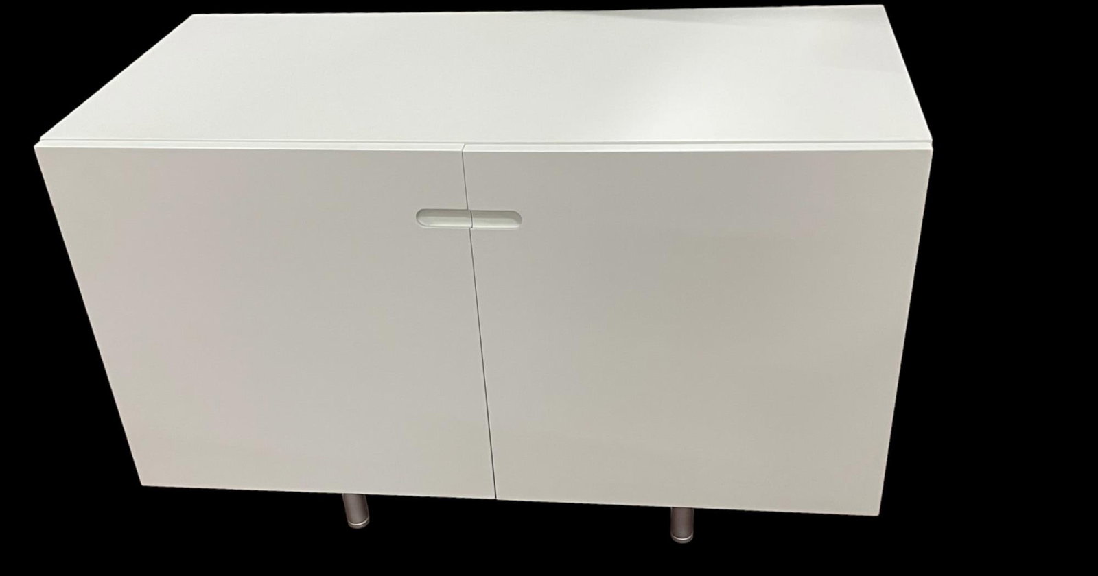 CONTEMPORARY WHITE METAL CABINET: CONTEMPORARY WHITE METAL CABINET. Height: 25 in. by Width: 38 in. by Depth: 19 in.