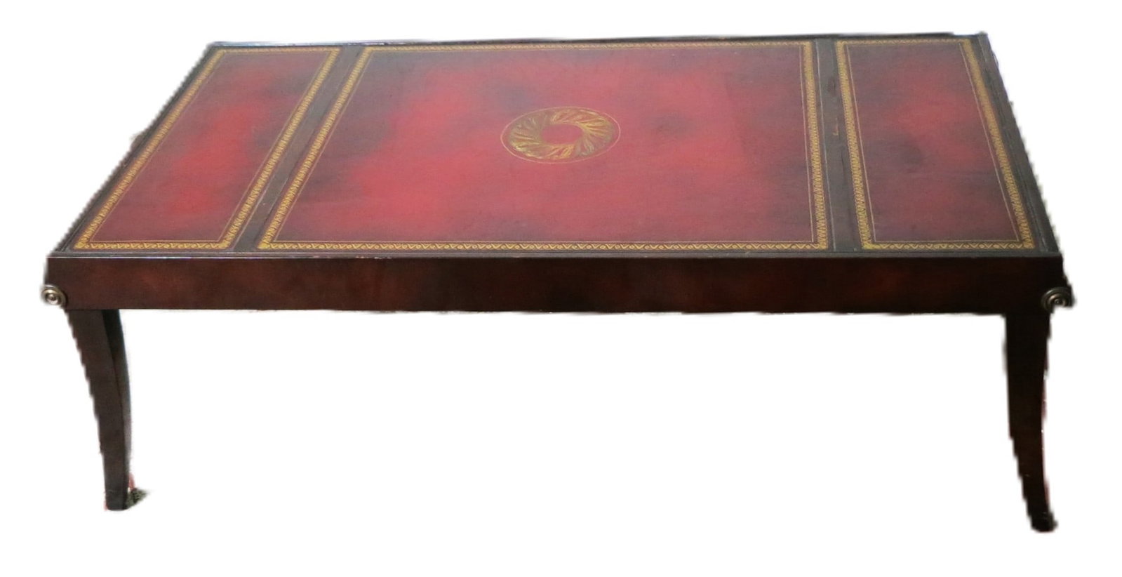 RED LEATHER COFFEE TABLE WITH REGENCY SPLAYED LEGS: RED LEATHER COFFEE TABLE WITH REGENCY SPLAYED LEGS, HAND TOOLS WITH GILT Height: 16 in. by Width: 46 in. by Depth: 23