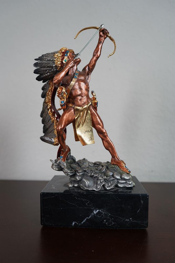 Tim T. Sullivan "Shooting Star" by Chimark in 1992: Tim T. Sullivan "Shooting Star" by Chimark in 1992 116/950 Copper/bronze-colored patina with gold painted garments and headdress accents on black marble base. (11) Height: 12" in. by Width: 6"
