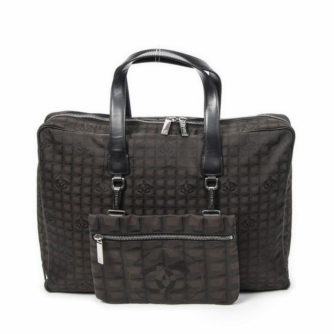 Chanel Travel Line Business Bag H: Chanel Travel Line Business Bag Handbag. Made from Travel Line Nylon Canvas with Black Leather straps/handles and Silver hardware. Dimensions: 36.5*26.5*6cm. Accessories include: Sticker, Pouch.