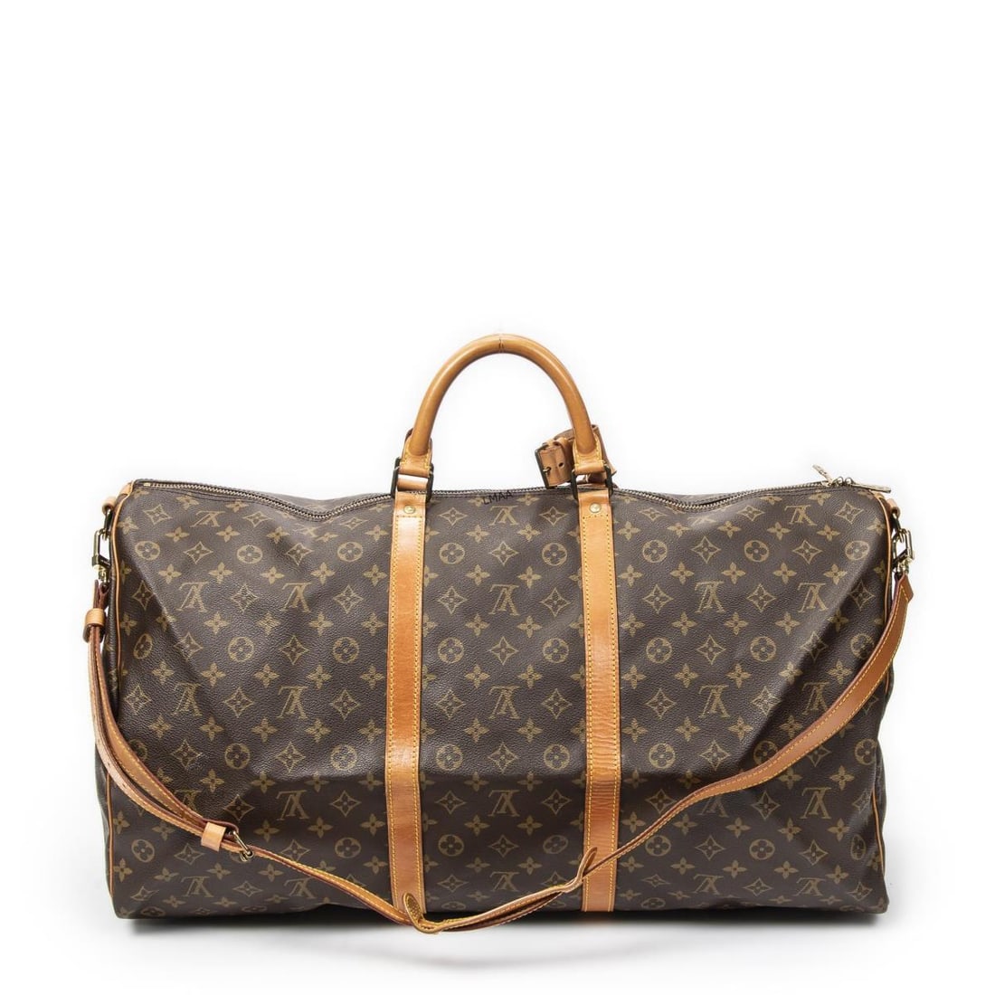 Louis Vuitton Keepall Bandouliere Travel Bag: Louis Vuitton Keepall Bandouliere Travel Bag. Made from Monogram Canvas with Vachetta straps/handles and Golden Brass hardware. Dimensions: 60*26*31cm. Accessories include: Long Strap, Luggage Tag,