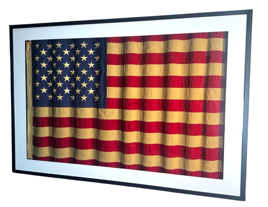 FRAMED HAND STITCHED AMERICAN FLAG: FRAMED HAND STITCHED AMERICAN FLAG Height: 41 in. by Width: 61