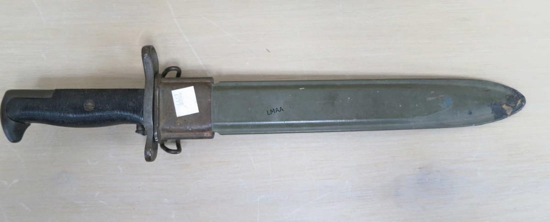 VINTAGE MILITARY DAGGER & SHEATH: VINTAGE MILITARY DAGGER & SHEATH. Height: 15.75 in. by Width: 3.5 in. by Depth: 1.5 in.