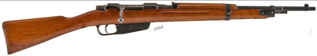 Terni M38 Fucile Corto 7.35x51 Carcano Carbine: Terni M38 Fucile Corto 7.35x51 Carcano carbine (c. 1939; ) w/ matching stock; period sling; refinished stock; moderate wear commensurate w/ age & use; some pitting; bore has moderate frosting. 21 in. 
