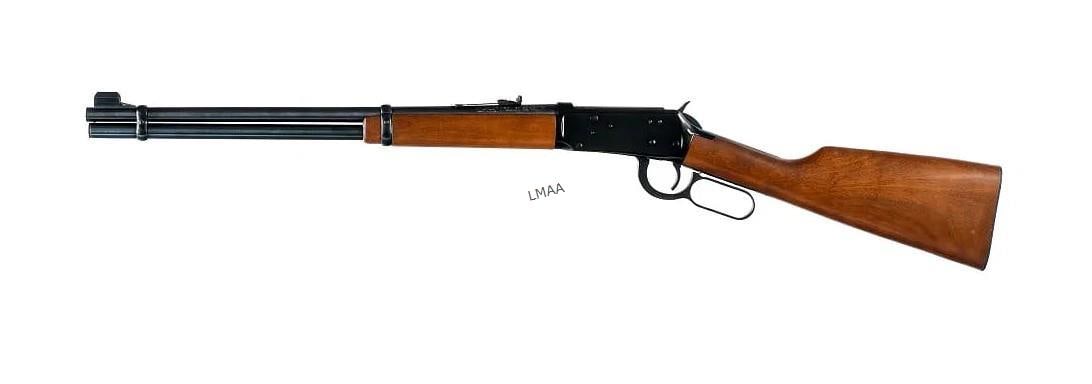 Winchester 94 .30-30 Win Lever Action Rifle: Winchester 94 Carbine in .30-30 Winchester with a seven round capacity and a 20" barrel. Made in New Haven Connecticut in 1969. Smooth wood stock and front foregrip. Blued hand lever, trigger, receive