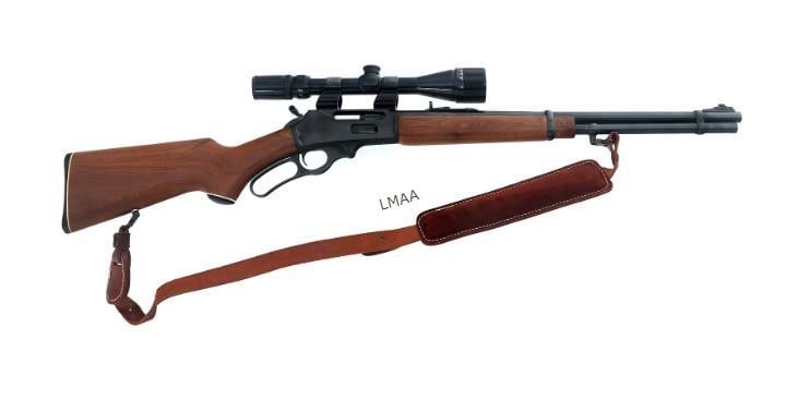 MARLIN MODEL 336-CS .30-30 LEVER ACTION RIFLE: Marlin Model 336-CS .30-30 caliber lever action carbine. Blued finish. Adjustable rear sight. Padded leather sling. Wood stock with composite butt plate. Bushnell Banner 4x-12x rifle scope with duplex