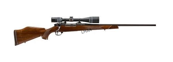 Weatherby Mark V Deluxe 300 Mag Bolt Action Rifle: Weatherby Mark V Deluxe 300 Bolt Action Rifle W/ Scope Manufacturer: Howa-Japan / Weatherby-USA (c. 1974) Model: Mark V Deluxe Caliber: 300 Wby Mag Barrel length: 24 in. OAL: 44.75 in. Condition: Good