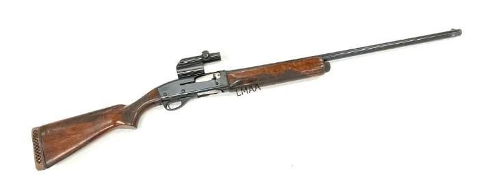 Remington Model 1100 .12 Ga Semi Automatic Shotgun: Remington Model 1100 .12 Ga Semi Automatic Shotgun with Scope. The Remington model 1100 .12 Ga shotgun is in nice used condition. This is a older model 1100 . Barrel measures 28 inches in length. Blue