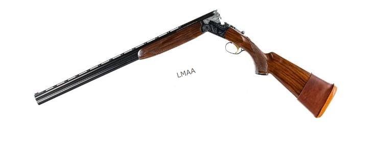 Ithaca / SKB 600 20Ga Over/Under Shotgun: Ithaca/SKB model 600 chambered in 20 Gauge for 3" shells with 28" vented rib over/under barrels. The top bore has a fixed FULL choke and the bottom bore has a fixed MOD choke. Blued finish with engrav