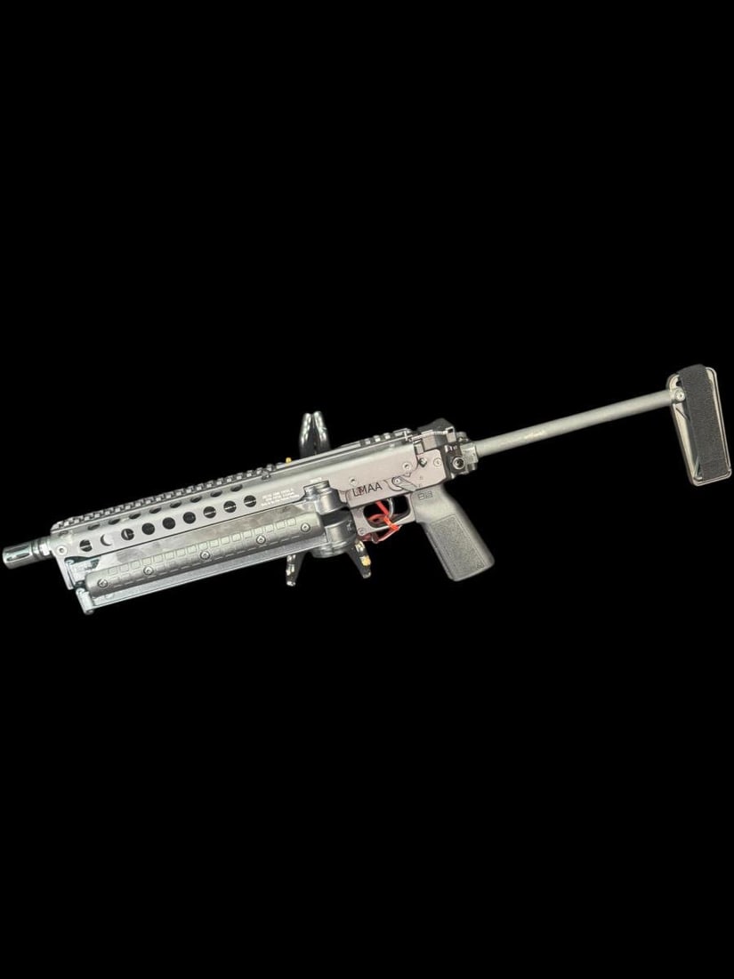 KEL-TEC KP50 SEMI AUTO-MATIC: KEL-TEC KP50 SEMI AUTO-MATIC PISTOL, CHAMBERED IN 5.7 X 28MM, BLACK FINISH, FULL LENGTH TOP ACCESSORY RAIL, VENTILATED FORE-END AND FOLDING STABILIZING BRACE