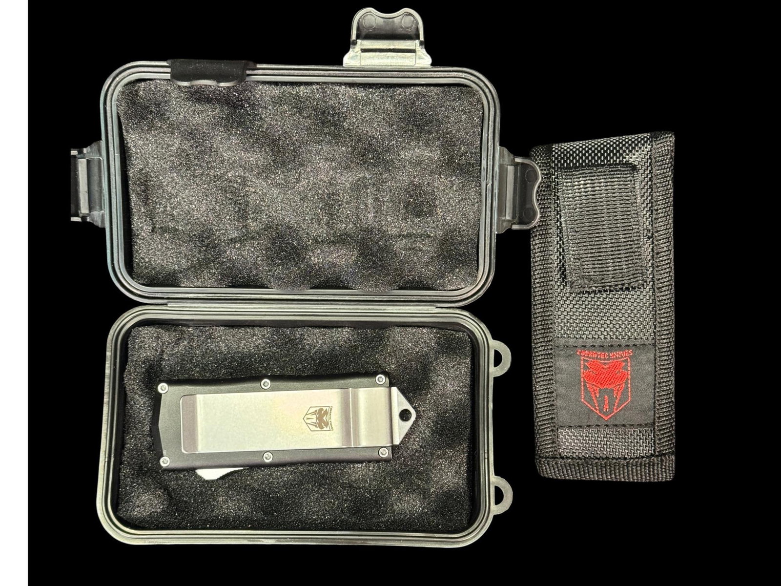 COBRATEC COMPACT OTF AUTOMATIC KNIFE: COBRATEC COMPACT OTF AUTOMATIC KNIFE, BLACK METAL HANDLE, STAINLESS STEEL POCKET CLIP, REAR GLASS BREAKER POINT AND SHORT DAGGER STYLE DOUBLE EDGE BLADE. 3.5" HANDLE, 5.5" WITH BLADE EXTENDED. BRAND N