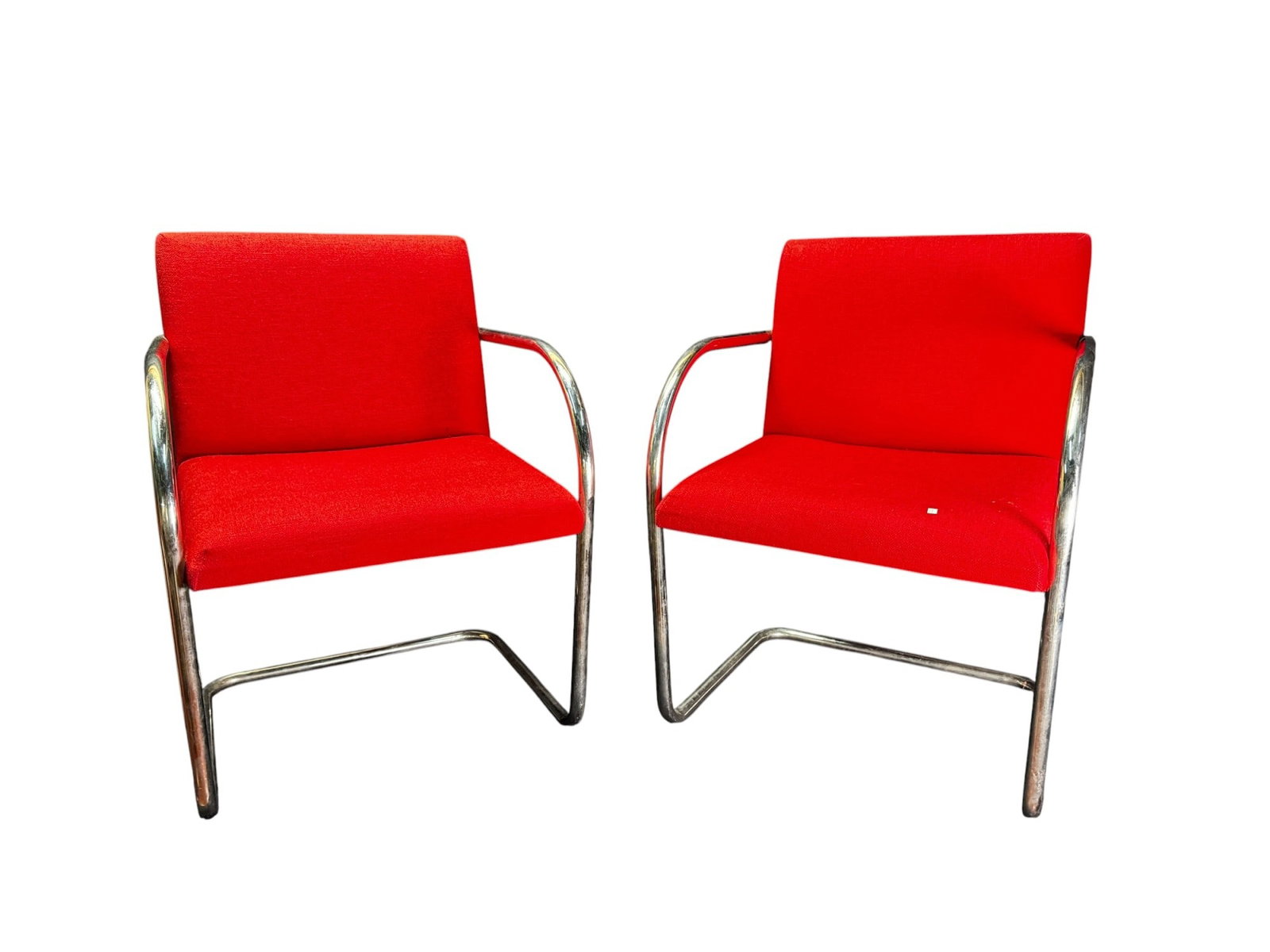 The Knoll Brno Chair, designed by Ludwig Mies van: PAIR OF BRNO ARM CHAIRS. The Knoll Brno Chair, designed by Ludwig Mies van der Rohe in 1930. Height: 32 in. by Width: 23 in. by Depth: 23 in.
