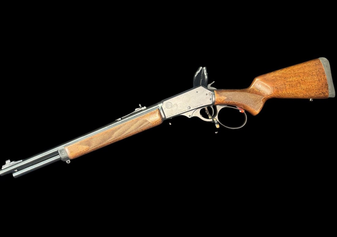 ROSSI R95 LEVER-ACTION RIFLE: ROSSI R95 LEVER-ACTION RIFLE. CHAMBERED IN .30-30 WINCHESTER WITH SHORTER 16.5 INCH BARREL. BRAND NEW IN THE BOX SERIAL # 7CF087209V. (L1041)