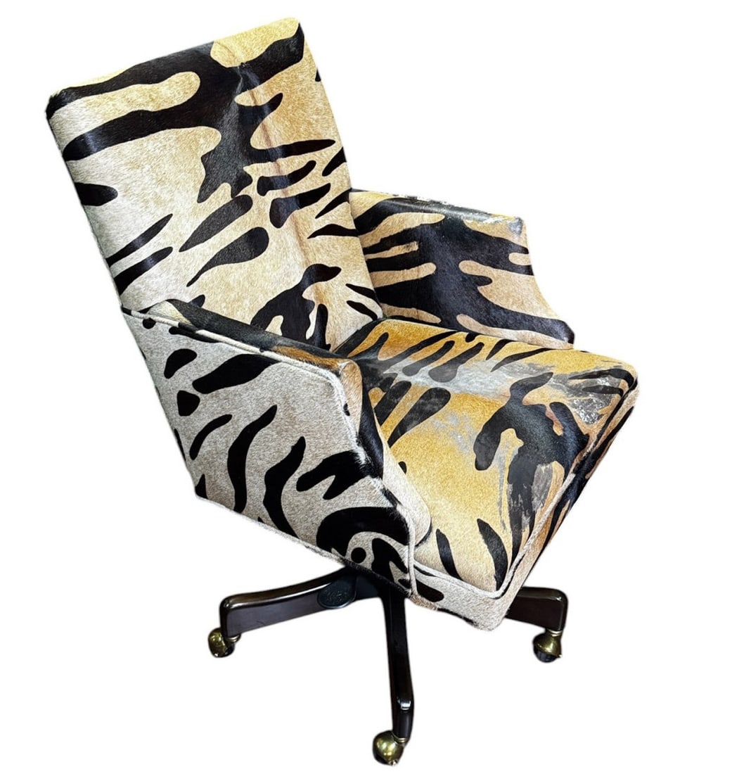 STENCILED COWHIDE PATTERNED FABRIC OFFICE CHAIR: STENCILED COWHIDE PATTERNED FABRIC OFFICE CHAIR. Height: 40 in. by Width: 24 in.
