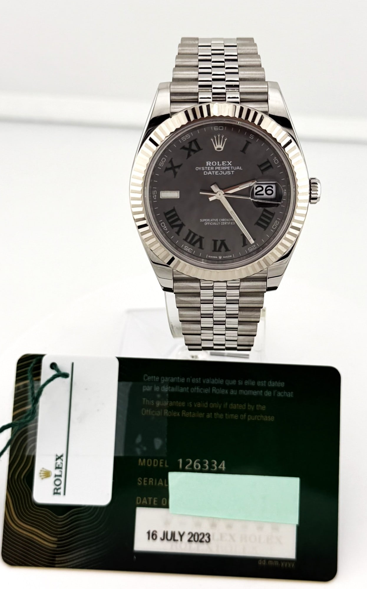 STAINLESS ROLEX DATEJUST W/ 18KT WG FLUTED BEZEL: STAINLESS ROLEX DATEJUST W/ 18KT WG FLUTED BEZEL