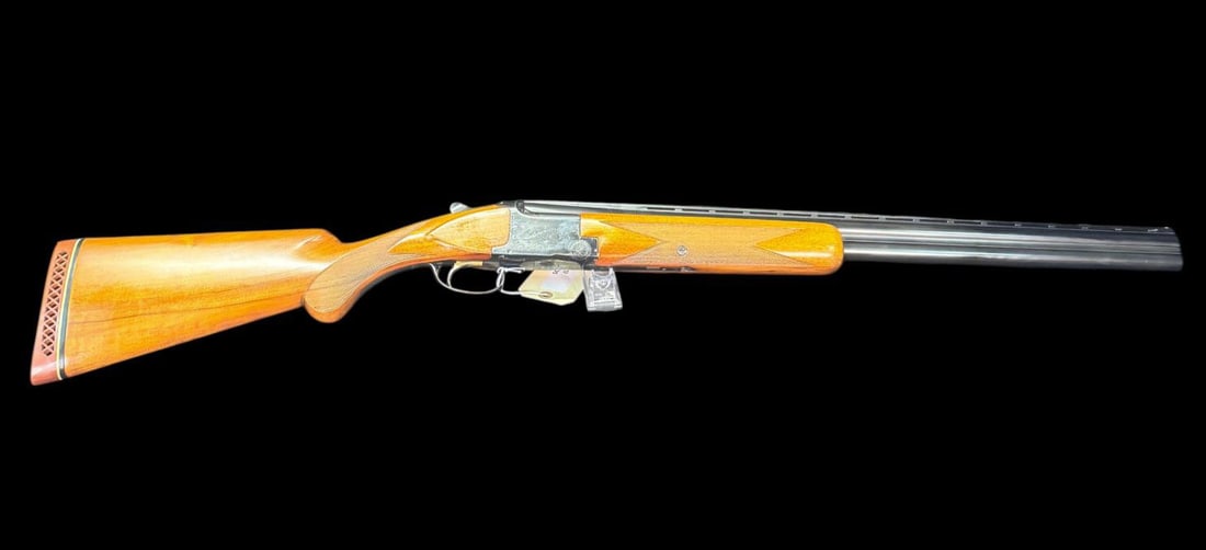 BELGIAN BROWNING GRADE I SUPERPOSED SKEET.: BELGIAN BROWNING GRADE I SUPERPOSED SKEET. Cal. 12 Ga., 2 3/4". . Mfg. 1964. VR 26.5" bbls. w/ steel & white beads; Skeet chokes. Blued with Grade I engraving & long tang. Checkered walnut stock set w