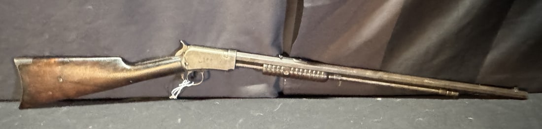 WINCHESTER 90 22 CAL PUMP RIFLE: WINCHESTER 90 22 CAL PUMP RIFLE. 22 W.R.F.; OCTAGON BARREL. SERIAL #701914. WS31/80. (L1093)