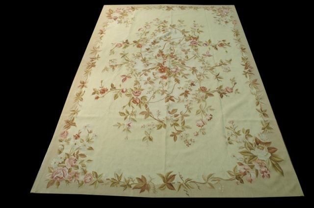 FRENCH AUBUSSON STYLE RUG: FRENCH AUBUSSON STYLE RUG. RUSTS IN A CAMEL BACKROUND. Height: 7 ft. 8 in. by Width: 11 ft. 5 in.