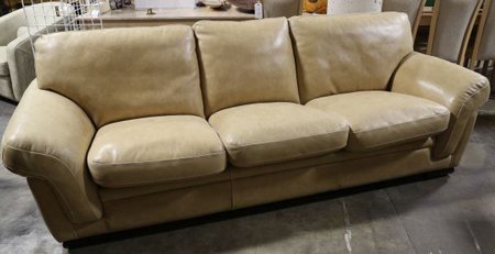 ITALIAN GAMMA ARREDAMENTI INTL. LEATHER SOFA: THREE-CUSHION ITALIAN GAMMA ARREDAMENTI INTERNATIONAL TAN LEATHER SOFA. Height: 34 in. by Width: 93 in. by Depth: 37 in.