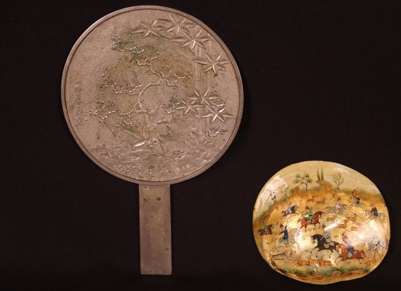 MIXED LOT OF TWO CHINESE PIECES: MIXED LOT OF TWO ANTIQUE CHINESE PIECES. ANTIQUE WHITE METAL CHINESE HAND MIRROR WITH PAINTED PERSIAN SHELL. Height: 10 in. by Width: 7 in. by Depth: 7 in.