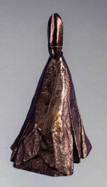 STEFAN BUDA "BISHOP" BRONZE PATINA PLASTER FIGURE: STEFAN BUDA "BISHOP" BRONZE PATINA OVER CAST PLASTER FIGURE. Height: 18 in. by Width: 11 in. by Depth: 5 in.