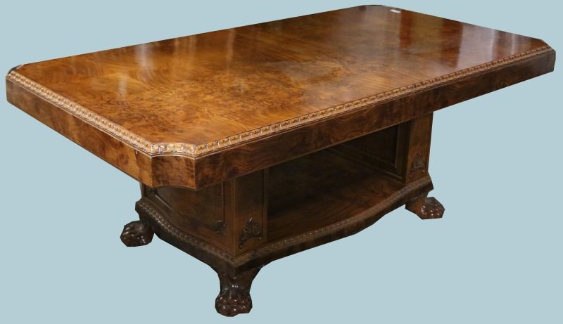 FRENCH WALNUT TABLE WITH CARVED GADROON EDGE: FRENCH WALNUT TABLE WITH CARVED GADROON EDGE AND CLAW FEET. THE TABLE EXTENDS TO 14 FEET, BUT THERE ARE NO LEAVES. Height: 30 in. by Width: 78 in. by Depth: 43 in.