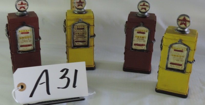 SET OF FOUR WROUGHT IRON GAS PUMPS: SET OF FOUR WROUGHT IRON GAS PUMPS. OLD STYLE BEFORE SELF SERVICE. A31