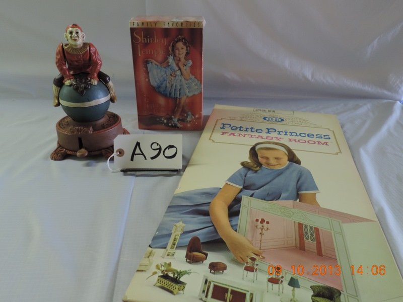 Shirley Temple VHS, clown bank,paper princess room: Cast iron clown bank. Shirley Temple VHS tapes new: “Heidi, Curly Top, Baby Take a Bow”. Ideal paper Petite Princess Fantasy Room.