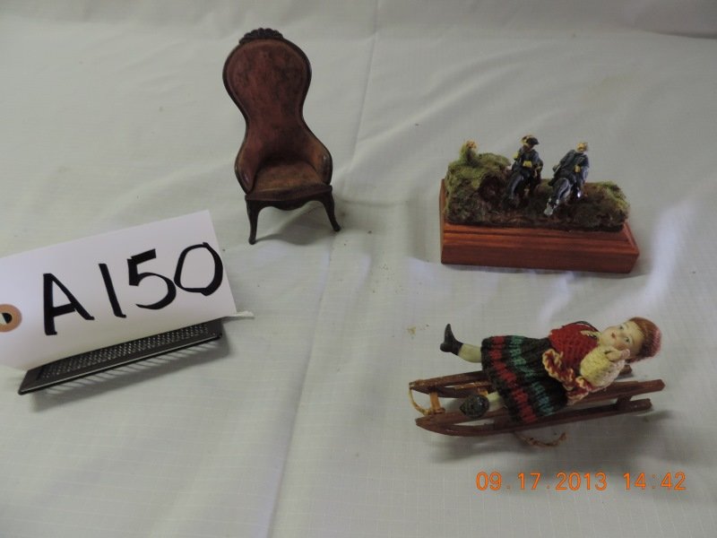 Mixed lot of doll furniture: Doll furniture, cast iron chair. Two men Grant and Lee mounted on horses on wooden block. One bisque doll on sleigh. a150