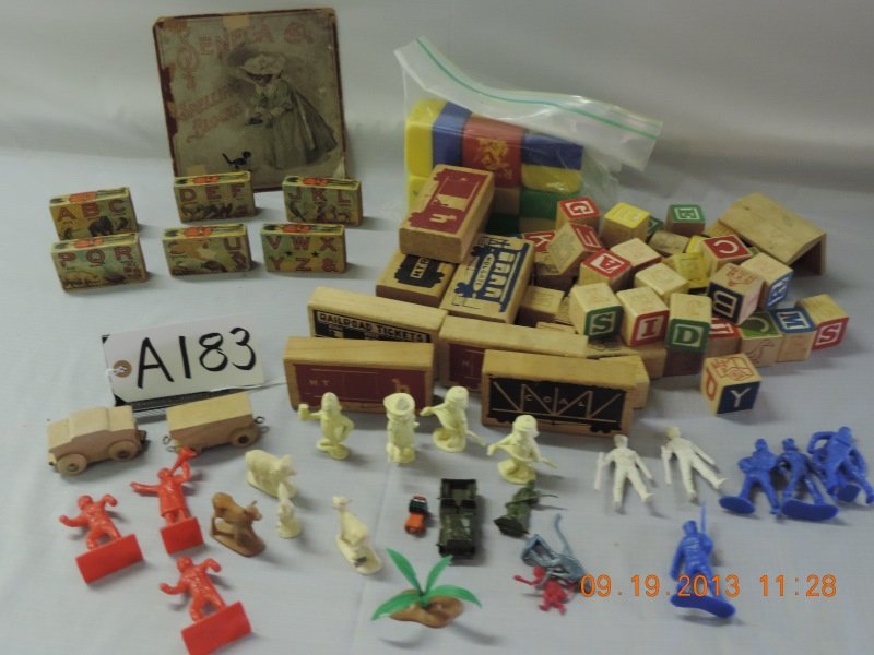 Mixed lot of toys: Plastic soldiers, red, blue, and white, misc rubber farm animals (4), wooden blocks with alphabet (square), various rectangular blocks with 6 having paper on them. One old front of block box and a set