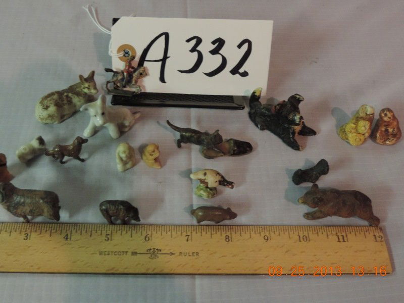 Mixed lot of miniature animals: Mixed lot of miniature animals: doe, white scotty dog, black scotty lying down, two small kittens, brown bear, ram small cast iron bear, turkey, pig, two monkeys, rider on horseback, irish setter, Sco