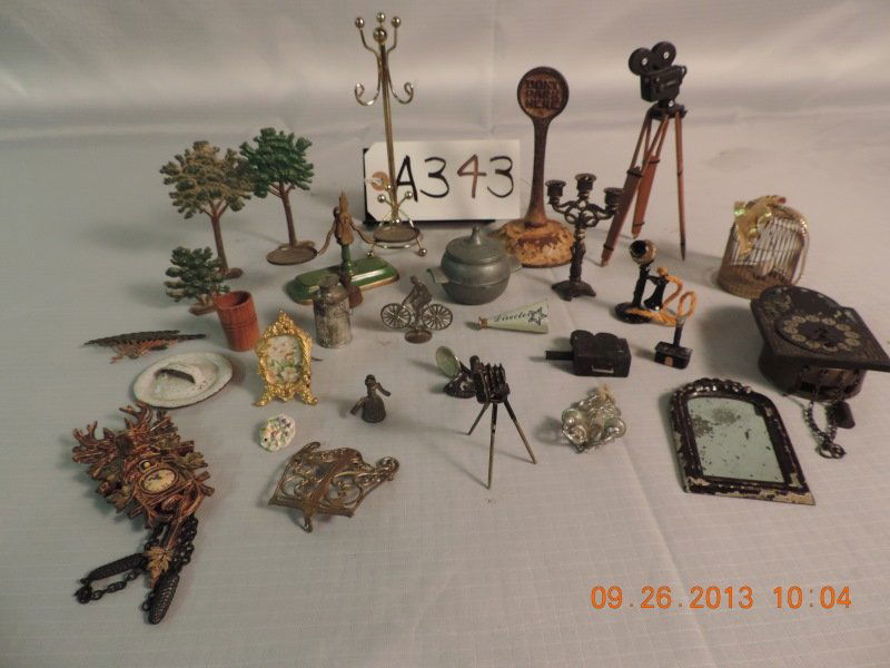 Mixed lot of doll house miniatures: Mixed lot of doll house miniatures: cast iron trees, cameras, no parking sign, 2 wall clocks, telephone, scale, etc. a343