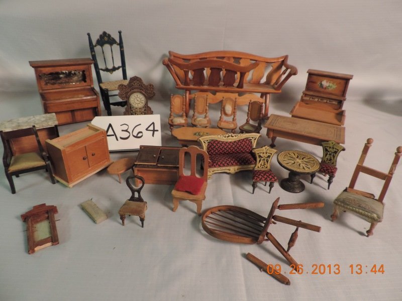 Mixed lot of doll house furniture: Mixed lot of doll house furniture: Table, 4 chairs, small paper on wood furniture, sofa, round table, 2 chairs and a shelf clock. A364