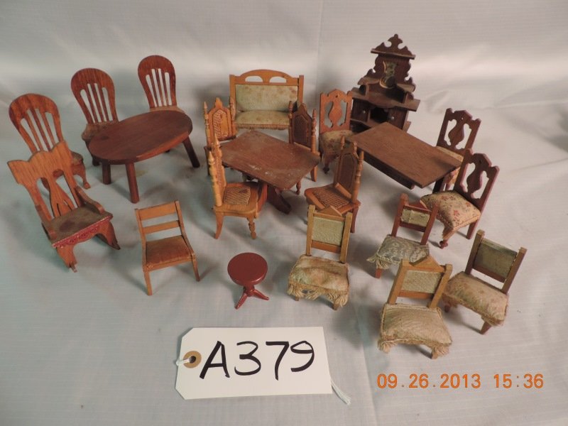 Three chairs, 3 tables, 4 chairs, pair of chairs,: Three chairs, 3 tables, 4 chairs, pair of chairs, curio with mirror, 4 wooden chairs, one love seat and a hall table. A379
