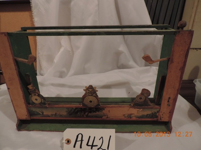 Diorama “Shooting Gallery” paper over wood target.: Diorama “Shooting Gallery” paper over wood targets - clowns.11"H X 17"W X 6"D A421