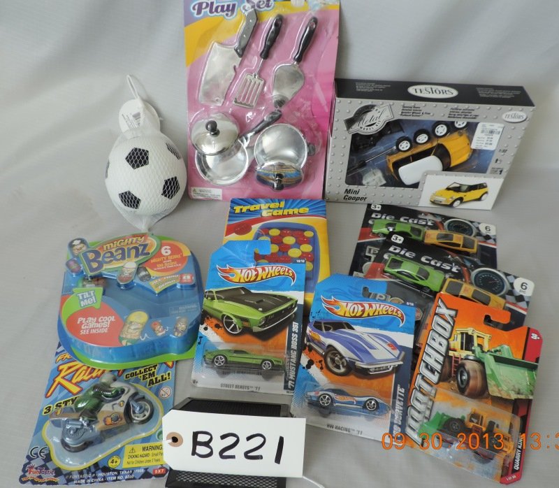 Match box mini cooper, die cast city set (2) Quarr: Match box mini cooper, die cast city set (2) Quarry King/ match box, soccer ball, metal cooking set, travel game, mighty beanz, Hot wheels: ’71 mustang, and 69 Corvette. B221