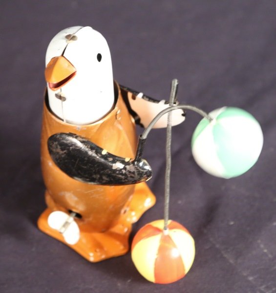 WIND UP PENGUIN TOY: WIND UP PENGUIN TOY Height: 7 in. by Width: 3 1/2 in. by Depth: 4 in.
