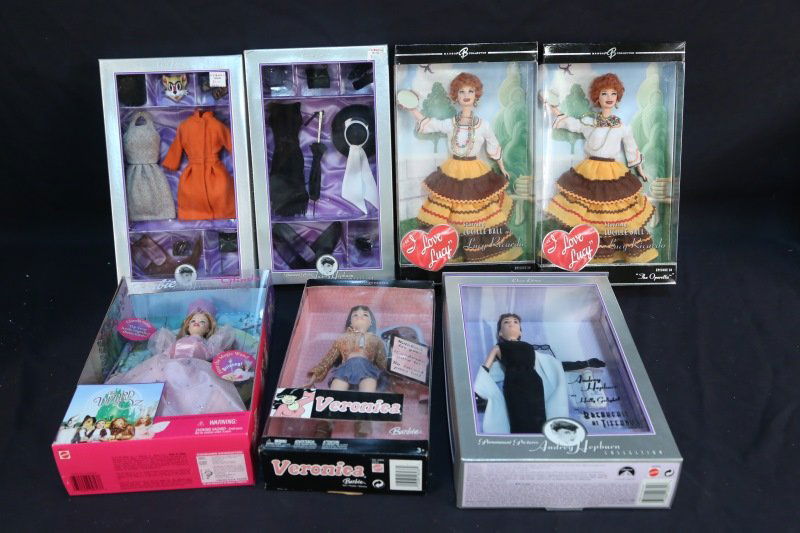 LOT OF 5 BARBIE DOLLS & 2 DOLL ACCESSORY SETS: LOT OF 5 BARBIE DOLLS & 2 DOLL ACCESSORY SETS. VERONICA BARBIE DOLL, GLINDA WIZARD OF OZ BARBIE DOLL, AUDREY HEPBURN AS HOLLY GOLIGHTLY, TWO=I LOVE LUCY "THE OPERETTA", TWO AUDREY HEPBURN ACCESSORIES