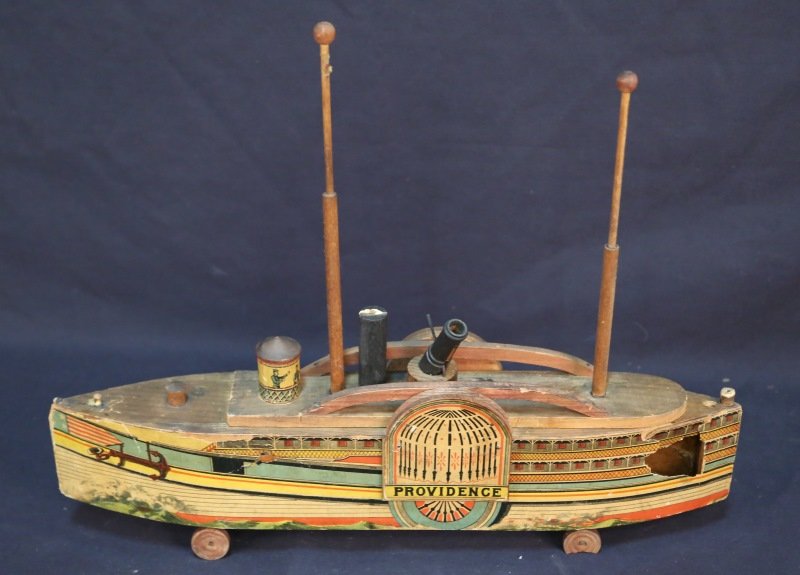 VINTAGE PAPER OVER WOOD TOY BOAT: VINTAGE PAPER OVER WOOD TOY BOAT. Height: 16 in. by Width: 21 in. by Depth: 3 1/2 in.