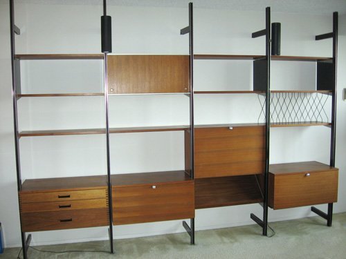 GEORGE NELSON CSS BOOK SHELF: GEORGE NELSON CSS BOOKSHELF.DOOR CABINET MISSING, NOT ACTUAL PHOTO. Height: 96 in. by Width: 166 in. by Depth: 14 in. Condition used: Scuffs and scratches throughout.