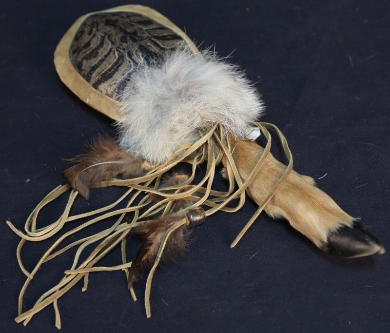 TURTLE SHELL RATTLE WITH DEER FOOT HANDLE: TURTLE SHELL RATTLE WITH DEER FOOT HANDLE. Height: 16 in. by Width: 6 in. by Depth: 2 in.
