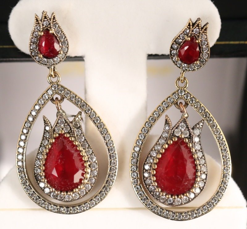 PAIR OF SIMULATED RUBY & DIAMOND EARRINGS: PAIR OF STERLING SILVER SIMULATED RUBY & DIAMOND EARRINGS. Height: 2 in. by Width: 1 in. by Depth: 1/8 in.