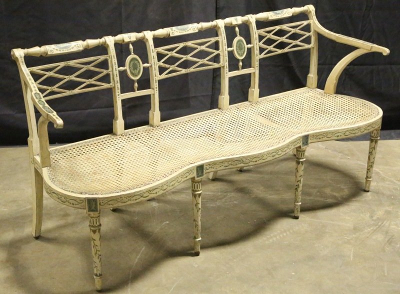 19th C. NEOCLASSICAL TASTE SETTEE, CIRCA 1810-1820: 19th CENTURY PAINTED THREE-SEAT SETTE WITH CANE SEAT AND TURNED LEGS. PAINTED IN THE NEOCLASSICAL TASTE. CIRCA 1810-20. Height: 31 in. by Width: 20 in. by Depth: 64 in.