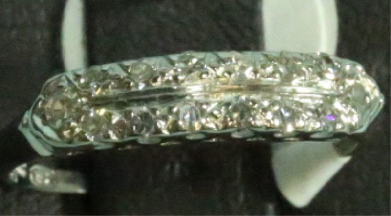 A Stamped 900 Plat 100 Irid Diamond Ring