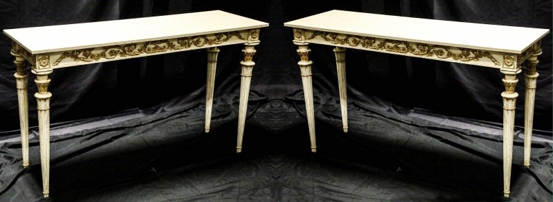 PAIR OF BEIGE VEINED MARBLE TOP CONSOLES: PAIR OF BEIGE VEINED MARBLE TOP CONSOLES IN THE NEOCLASSICAL TASTE, GOLD LEAF ON ANTIQUE WHITE FINISH. Height: 35 in. by Width: 60 in. by Depth: 20 in.