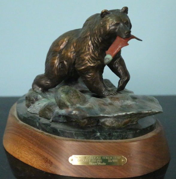 DANIEL PARKER "GRIZZLY BEAR" BRONZE #33/100: DANIEL PARKER "NORTH AMERICAN COLLECTION GRIZZLY BEAR" BRONZE SCULPTURE, EDITION NUMBER 33/100. Height: 8 1/2 in. by Width: 10 in. by Depth: 8 1/2 in.