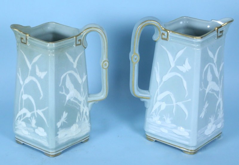 PAIR OF ANTIQUE CELADON SPODE PITCHERS: PAIR OF ANTIQUE CELADON SPODE PITCHERS DECORATED WITH RAISED BIRDS & DRAGONFLIES. Height: 7 1/2 in. by Width: 5 1/2 in. by Depth: 5 1/2 in.