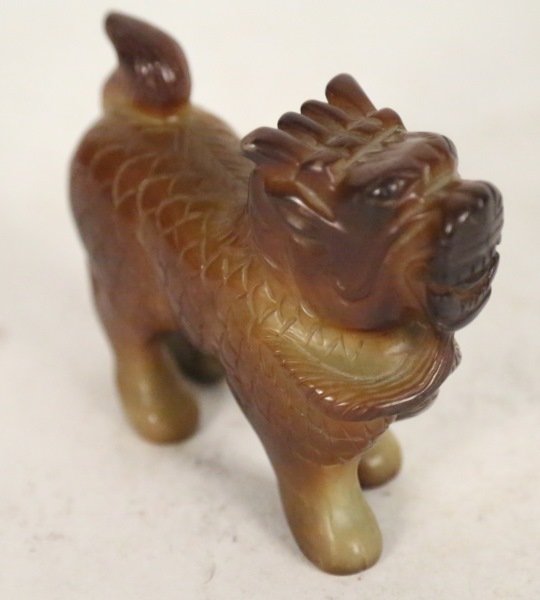 CARVED JADE CHINESE FOO DOG: CARVED JADE CHINESE FOO DOG. Height: 3 1/2 in. by Width: 4 1/2 in. by Depth: 1 1/2 in.