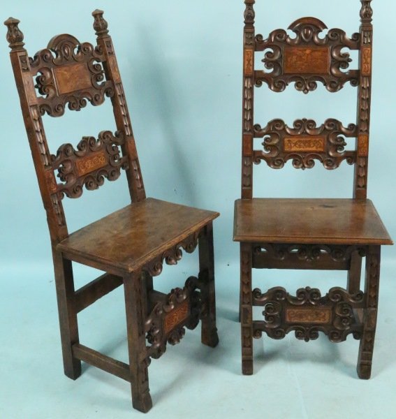 PAIR OF 17th CENTURY IBERIAN LADDER BACK CHAIRS: PAIR OF 17th CENTURY IBERIAN LADDER BACK CHAIRS WITH CARVED INLAID CARTOUCHE. Height: 51 in. by Width: 20 in. by Depth: 15 in.