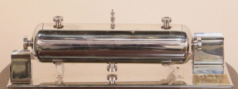 ART DECO CHROME CIGAR HOLDER: ART DECO CHROME CIGAR HOLDER. INTERIOR ROTATES TO PRESENT CIGARS. Height: 4 in. by Width: 12 in. by Depth: 4 in.